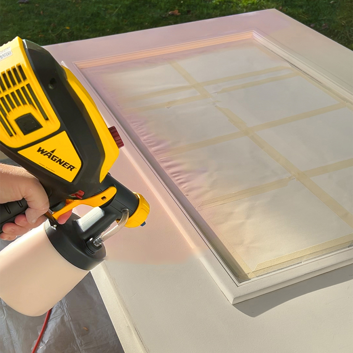 WAGNER painting the door pink